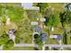 Aerial view of a 1-acre lot with two homes, a shed, and space for a junk truck and boat in Loganville, GA at 215 Fair St, Loganville, GA 30052