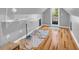 Finished attic features hardwood floors, an exterior exit, and built in storage at 215 Fair St, Loganville, GA 30052