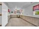 A spacious room with carpet, neutral paint, and natural light makes it perfect as an extra living space at 215 Fair St, Loganville, GA 30052