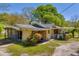 Charming single-story home with a covered porch and well-maintained landscaping in a tranquil setting at 215 Fair St, Loganville, GA 30052