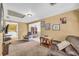 Living room with carpet, natural light, and a comfortable seating area at 215 Fair St, Loganville, GA 30052