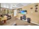 Cozy living room with carpet flooring and media setup at 215 Fair St, Loganville, GA 30052