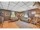 Living room featuring hardwood floors, traditional furnishings, and natural light at 215 Fair St, Loganville, GA 30052