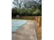 Fenced-in backyard with concrete patio, in-ground pool and storage shed at 4184 Red Laurel Way, Snellville, GA 30039