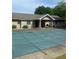 Backyard with inground pool, concrete patio, and covered patio area at 4184 Red Laurel Way, Snellville, GA 30039