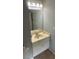 Bathroom featuring a marble counter top vanity, mirror, light bar and standard toilet at 4184 Red Laurel Way, Snellville, GA 30039