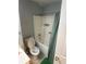 Bathroom with a shower-tub combination and white tile, enhanced by a green curtain at 4184 Red Laurel Way, Snellville, GA 30039