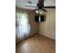 Bedroom featuring a ceiling fan, a window, light colored walls and flooring and natural light at 4184 Red Laurel Way, Snellville, GA 30039
