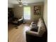 Open and airy bedroom area with natural light, seating and closet at 4184 Red Laurel Way, Snellville, GA 30039