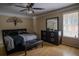 Comfortable bedroom with modern furnishings, natural light, and a spacious layout, perfect for relaxation at 4184 Red Laurel Way, Snellville, GA 30039