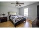Serene bedroom with modern decor, natural light, and a comfortable layout, promoting restful sleep at 4184 Red Laurel Way, Snellville, GA 30039