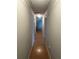 Hallway with decoratively trimmed walls and ceiling open to the rest of the home at 4184 Red Laurel Way, Snellville, GA 30039