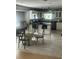 Open kitchen with an island, breakfast bar, and white cabinets providing a spacious and bright space at 4184 Red Laurel Way, Snellville, GA 30039