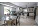 Bright kitchen and breakfast nook area featuring stainless appliances and aquarium at 4184 Red Laurel Way, Snellville, GA 30039