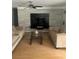 Stylish living room with modern tile accent wall and comfortable seating at 4184 Red Laurel Way, Snellville, GA 30039