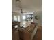 Open concept living room that flows into the kitchen and dining area with ample seating at 4184 Red Laurel Way, Snellville, GA 30039
