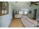 Expansive living room featuring hardwood floors, modern decor, and ample space for entertaining guests at 4184 Red Laurel Way, Snellville, GA 30039