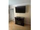 Cozy living room with entertainment center, fireplace and mounted flat screen TV at 4184 Red Laurel Way, Snellville, GA 30039