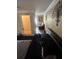 Main bedroom with decoratively trimmed walls open to sitting room with plenty of light at 4184 Red Laurel Way, Snellville, GA 30039