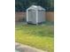 Outdoor storage shed in the backyard is perfect for lawn and garden equipment at 4184 Red Laurel Way, Snellville, GA 30039