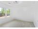 Bedroom featuring natural light and neutral carpet at 4307 Cedar Wood Sw Dr, Lilburn, GA 30047
