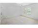 Bedroom featuring a neutral carpet and natural light at 4307 Cedar Wood Sw Dr, Lilburn, GA 30047