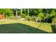 Spacious backyard featuring garden trellis at 4662 Burns Rd, Lilburn, GA 30047