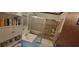 Cozy bathroom featuring a vanity, toilet, and a tiled shower with a sliding glass door at 4662 Burns Rd, Lilburn, GA 30047
