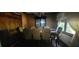 Traditional dining room featuring a large wooden table, upholstered chairs, and a china cabinet at 4662 Burns Rd, Lilburn, GA 30047