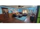 Comfortable living room featuring blue walls, wood trim, and cozy furniture at 4662 Burns Rd, Lilburn, GA 30047
