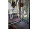 Relaxing screened porch with comfortable seating and views of the lush backyard at 502 S Evelyn Nw Pl, Atlanta, GA 30318