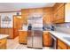 Bright kitchen featuring stainless steel appliances, granite counters, and ample cabinet space at 2435 Farmer Road, Conyers, GA 30012