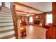 Comfortable living room with a cozy fireplace and an adjacent staircase at 2435 Farmer Road, Conyers, GA 30012