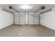 Spacious two car garage perfect for parking and storage of vehicles and equipment at 1363 To Lani Farm Rd, Stone Mountain, GA 30083