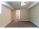 Basement featuring neutral walls, carpet, and a doorway leading to another room at 2032 Parker Ranch Se Rd, Atlanta, GA 30316