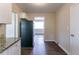 Spacious kitchen with stainless steel refrigerator and modern countertops at 2032 Parker Ranch Se Rd, Atlanta, GA 30316