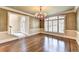 Elegant dining room with hardwood floors and natural light at 320 Chason Wood Way, Roswell, GA 30076