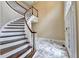 Open foyer featuring a curved staircase and marble tile at 320 Chason Wood Way, Roswell, GA 30076