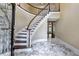 Elegant foyer with curved staircase and marble flooring at 320 Chason Wood Way, Roswell, GA 30076