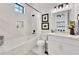 Chic bathroom featuring a tub, shower, and modern fixtures at 1455 Rucker Cir, Woodstock, GA 30188