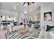Open concept living room featuring a dining area and modern kitchen at 1455 Rucker Cir, Woodstock, GA 30188