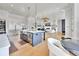 Open kitchen flowing into a spacious living area with a fireplace and stylish decor at 1455 Rucker Cir, Woodstock, GA 30188