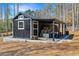 Well-maintained shed with covered storage, perfect for tools and equipment at 1455 Rucker Cir, Woodstock, GA 30188