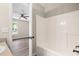 Bathroom with a shower and view into a spacious bedroom at 201 Rustin Dr, Dallas, GA 30157