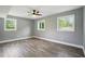 Spacious bedroom features hardwood floors, ceiling fan and plenty of natural light at 3031 San Jose Dr, Decatur, GA 30032
