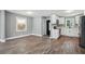 Modern kitchen with white cabinets, stainless steel appliances, and open layout at 3031 San Jose Dr, Decatur, GA 30032