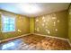 Bedroom with unfinished olive drab colored walls and tile floors at 1098 Cown Rd, Villa Rica, GA 30180
