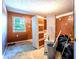 Bedroom featuring a window, brown walls, and built in drawers at 1098 Cown Rd, Villa Rica, GA 30180