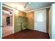 Mudroom entryway featuring practical storage solutions, shelving, and tiled floor at 1098 Cown Rd, Villa Rica, GA 30180