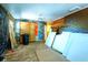 Unfinished living room showing exposed brick and colorful walls at 1098 Cown Rd, Villa Rica, GA 30180
